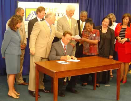 Governor of California Arnold Schwarzenegger signs the new state legislation Senate Bill 1137