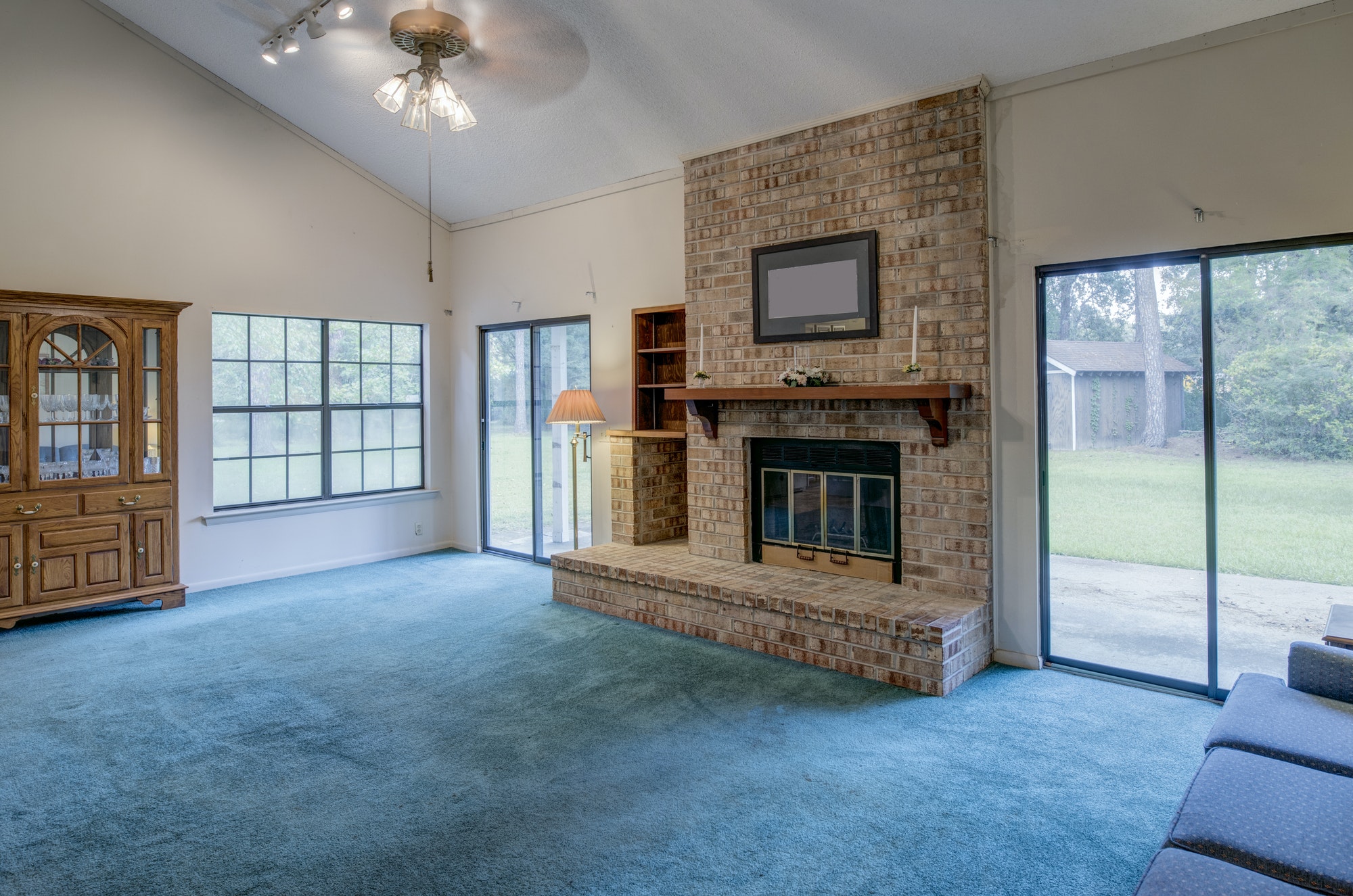 Simple living room in need of remodel.